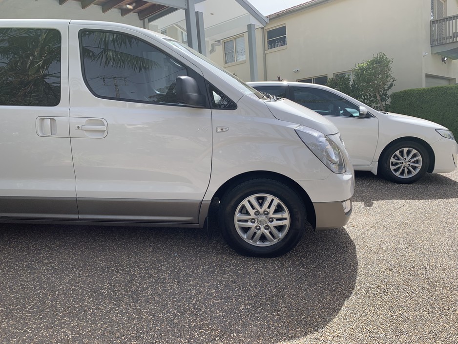 Shoal Bay Shuttle Service Pic 1 - Shuttle bus carries 7 passengers driver Also a Toyota Camry for smaller groups