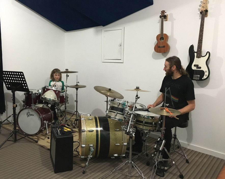 Rockstart Pic 1 - Cory giving a drum lesson in the Rockstart Studio