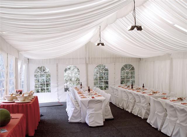 McStructure Clearspan Structure Hire Pic 1 - 6m by 12m wedding marquee with carpet tiles timber floor and silk lining