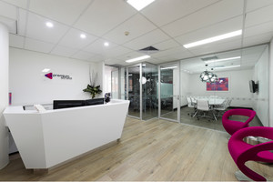 Inspired Spaces Pic 2 - Surry Hills office refurbishment An empty shell to begin with with some of the key features being custom designed reception desk artwork and wall paper