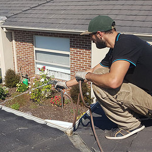 Spotless Gutter Cleaning Pic 3 - Checking for blockages