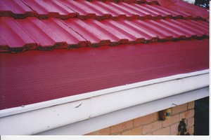 Leafshield Pic 5 - Tiled perimeter in Red with matching trim on gutters