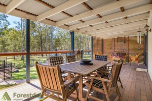 Forestdale Property Agent Pic 5 - Greenbank Relax on back deck looking over the Pool