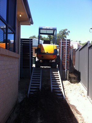 Everything EARTHWORX Pic 3 - Over retaining walls through gates