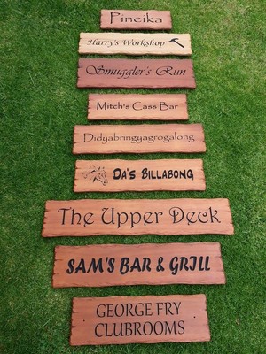 Australian Workshop Creations Pic 3 - An assortment of outdoor wooden signs made from Cedar