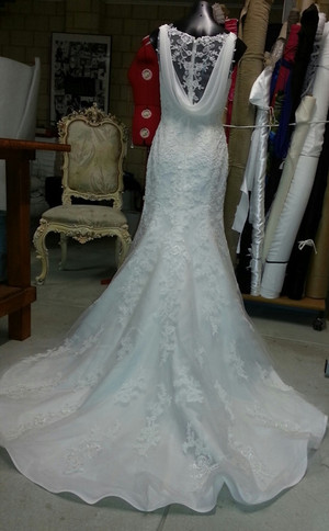 Annie designs and alterations Pic 2 - nips and tucks to this stunning gown