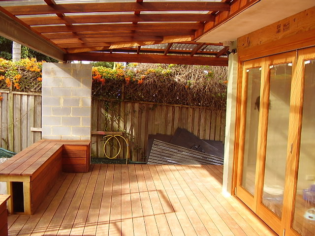 Core Carpentry & Building Pic 2 - a new back deck bifold doors pergola with seatsaround the edges