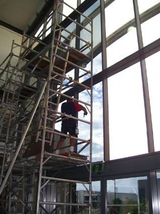 Newcastle Window Tinting Pic 1 - Commercial window tinting high windows require a scaffold to apply the tint