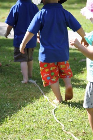 Marchant Park Kindergarten Pic 5 - Barefoot fun in the lush green grass outdoors