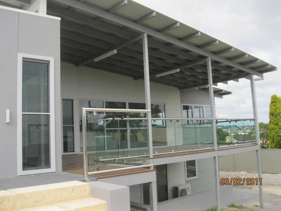 Bill's Contracting Pic 1 - skillion roof contruction with matrix board cladding jarrah decking with stainless stell and glass balustraide