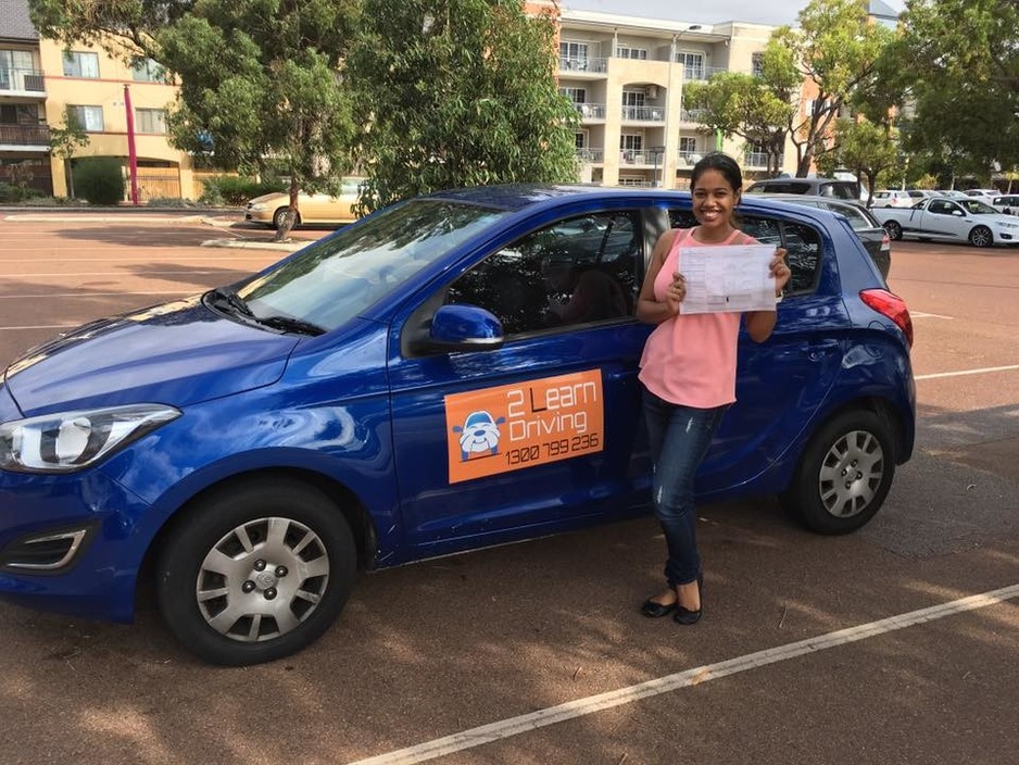 2 Learn Driving Pic 1 - A happy student passing her test after training with instructor Jenny