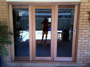 Coleman Carpentry and Glazing Pic 2 - New cedar BiFold door replacing 2 panel slider