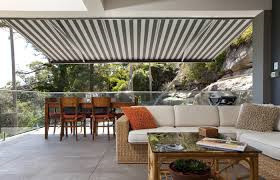 Canvas n Shades Pic 5 - Retractable folding arm awning