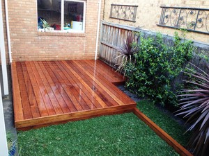 Viridem Landscaping Pic 2 - Merbau decking and natural turf