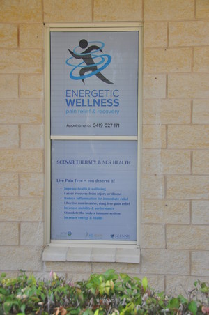 Energetic Wellness Pic 2 - Energetic Wellness Therapy room window sign