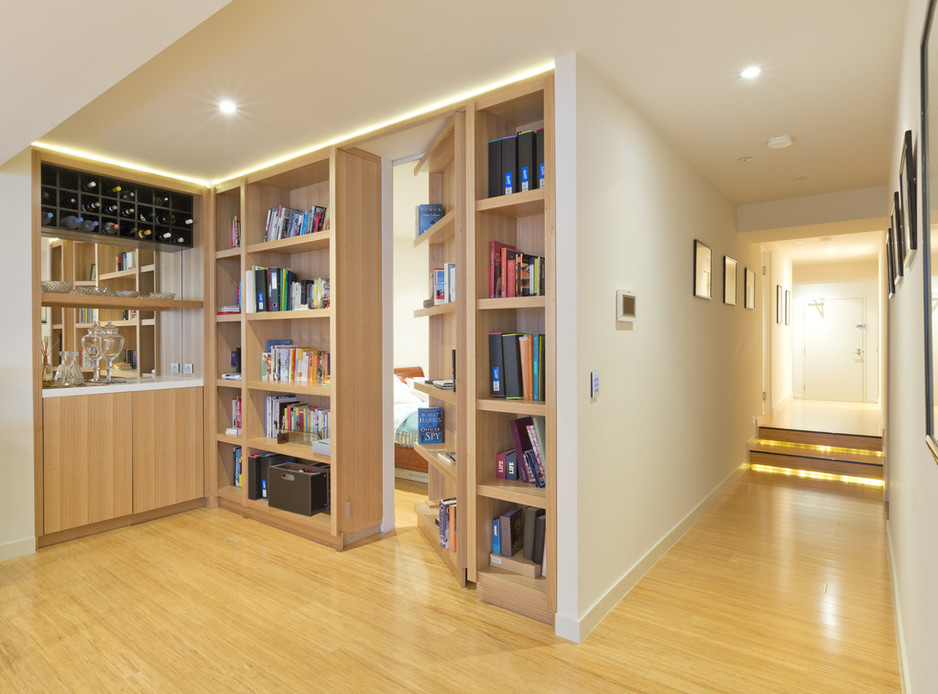 The Precision Group Pic 1 - Installation of Timber flooring steps with LED highlights Secret Bookcase door