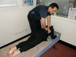 Engadine Chiropractor - Dr Cameron Hopkins Pic 3 - Dr Hopkins adjusting in his office