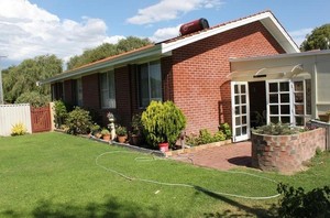 Busselton Beach Stayz Holiday Home Pic 2 - Private yard with outside barbeque facilities