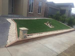 DASH Landscaping Pic 4 - Landscaping with artificial turf and pebbles in craigieburn