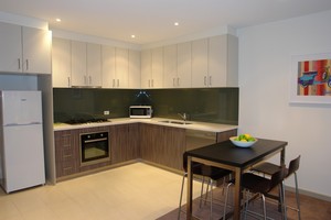 Apartments Of Waverley Pic 3 - Fullyequipped kitchen and dining including laundry with dryer