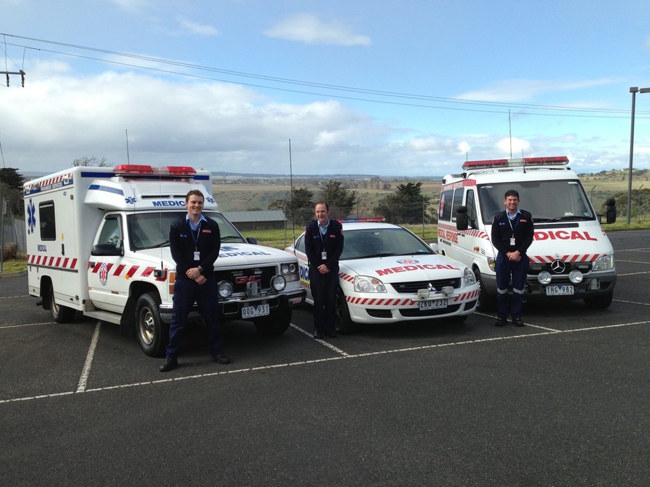 Paramedic Services Pic 1 - A few of Paramedic Services vehicles and staff members on display