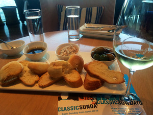 Mr & Mrs G Riverbar Pic 2 - Breads dips and a glass of white